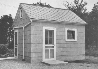 Vintage photo of a farmers' milk house built with asbestos