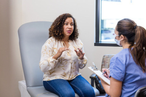 Patient advocating for herself with her health care provider