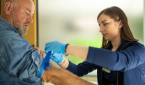 Nurse preparing a patient for a blood donation